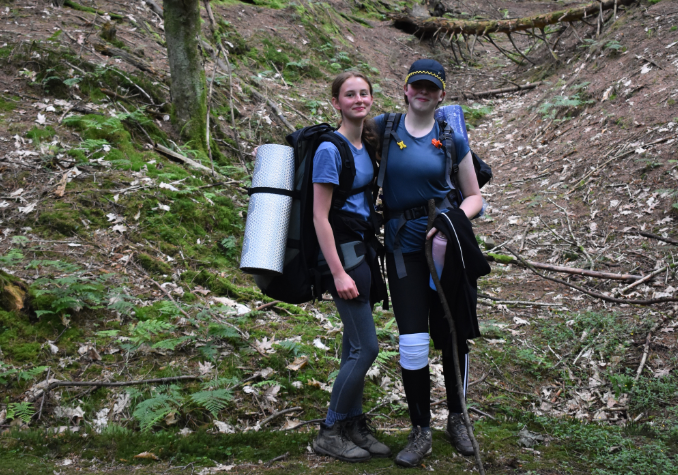 Pupils Lily R and Ava T in the forest